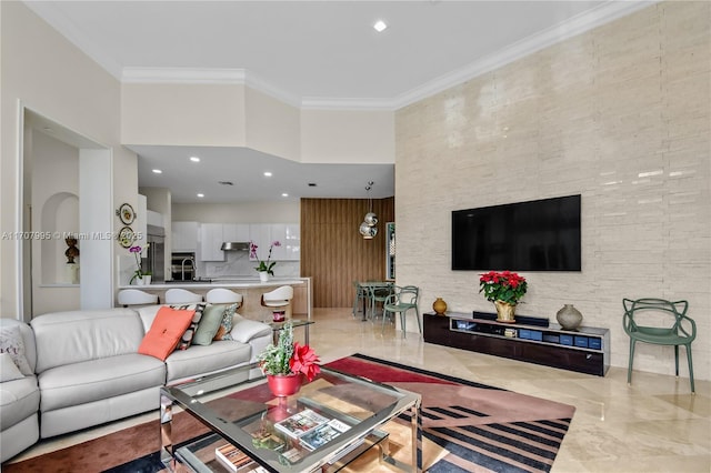 2445 Provence Cir, Weston, FL 33327 - living area with recessed lighting, ornamental molding, marble finish floor, and a towering ceiling
