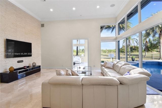 2445 Provence Cir, Weston, FL 33327 - living area featuring crown molding, recessed lighting, baseboards, and a towering ceiling