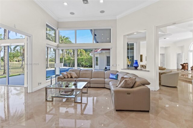 2445 Provence Cir, Weston, FL 33327 - living area with crown molding, baseboards, and a high ceiling