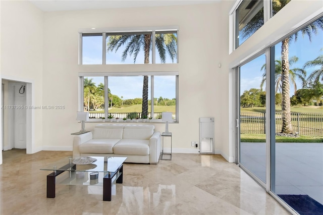 2445 Provence Cir, Weston, FL 33327 - living area with baseboards and a towering ceiling