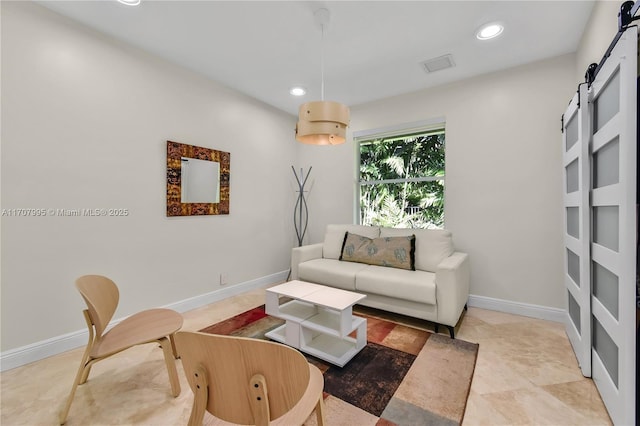 2445 Provence Cir, Weston, FL 33327 - living room featuring baseboards, recessed lighting, and a barn door