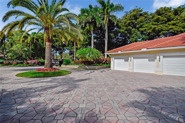 2445 Provence Cir, Weston, FL 33327 - garage with decorative driveway