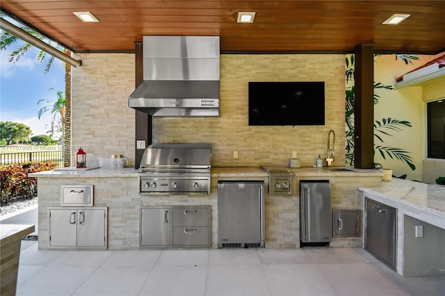 view of patio featuring area for grilling, a grill, and sink