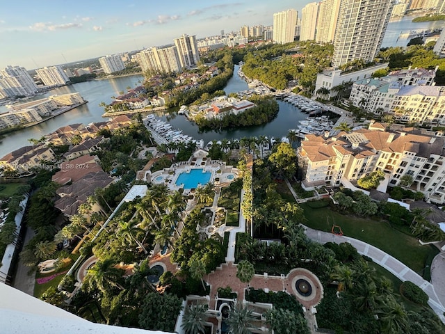 birds eye view of property with a water view