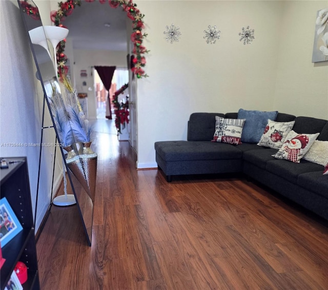 living room with dark hardwood / wood-style floors