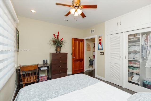 bedroom featuring access to exterior, ceiling fan, a closet, and wood-type flooring