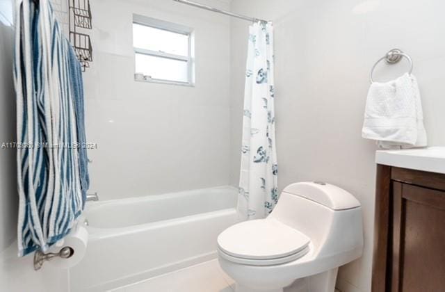 full bathroom with tile patterned floors, shower / bath combination with curtain, toilet, and vanity