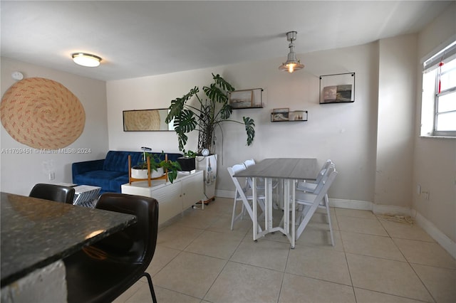 dining room with light tile patterned floors