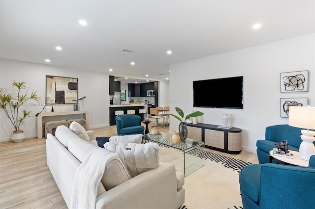 living room featuring light wood-type flooring