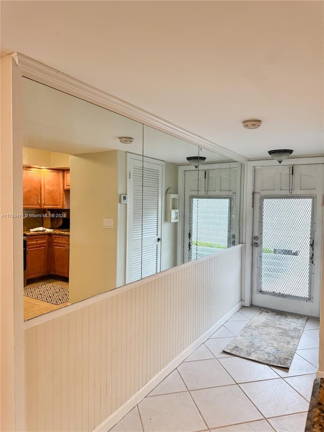 interior space with light tile patterned floors