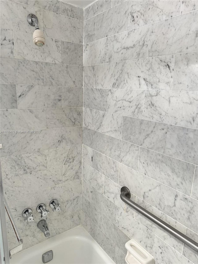 bathroom with shower / bathing tub combination