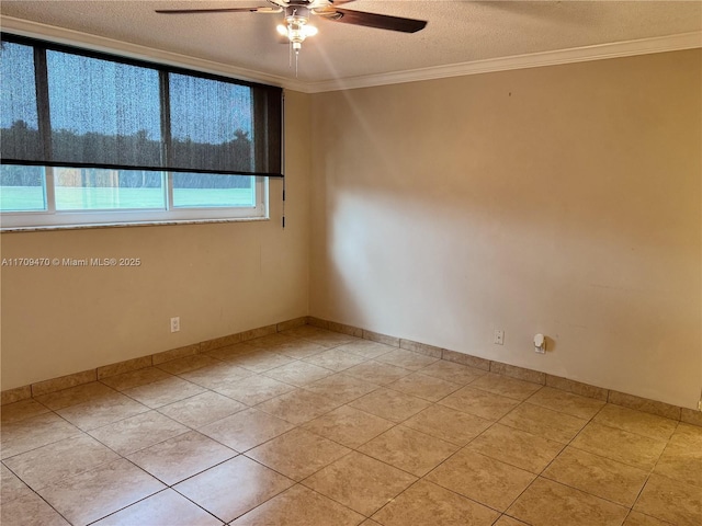 spare room featuring a textured ceiling, a ceiling fan, and ornamental molding