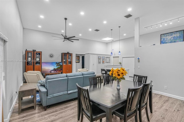 dining room featuring light wood-type flooring and ceiling fan