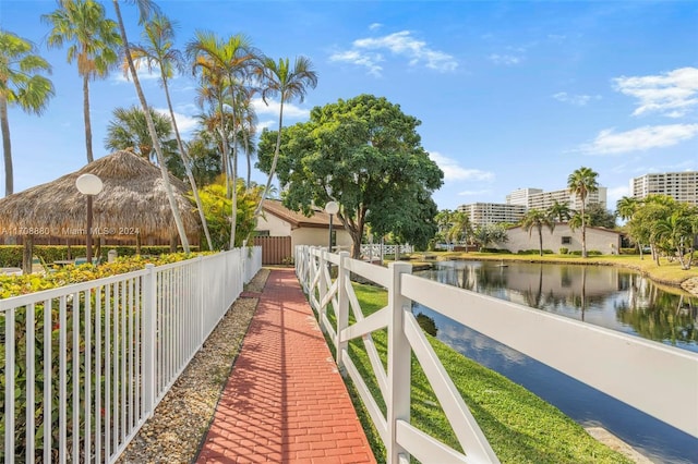 exterior space with a gazebo and a water view