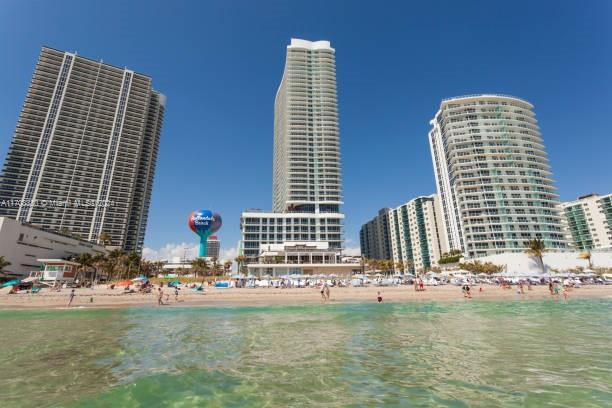 view of water feature with a beach view