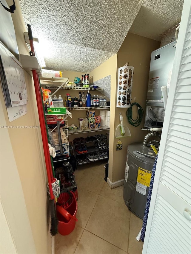 storage area featuring water heater