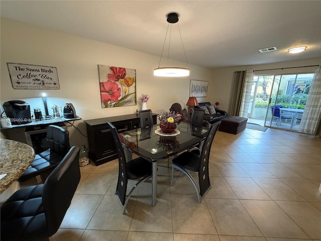 view of tiled dining space