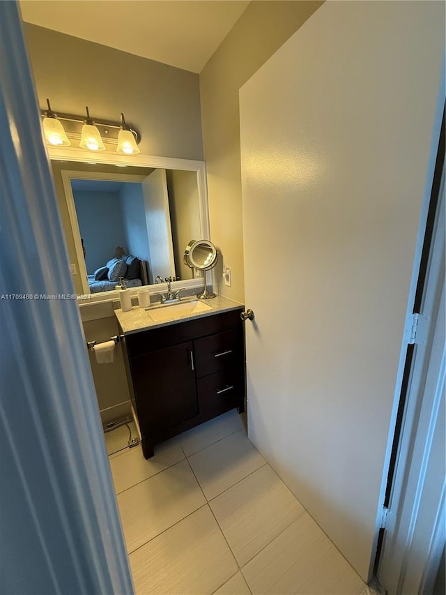 bathroom with vanity and tile patterned floors