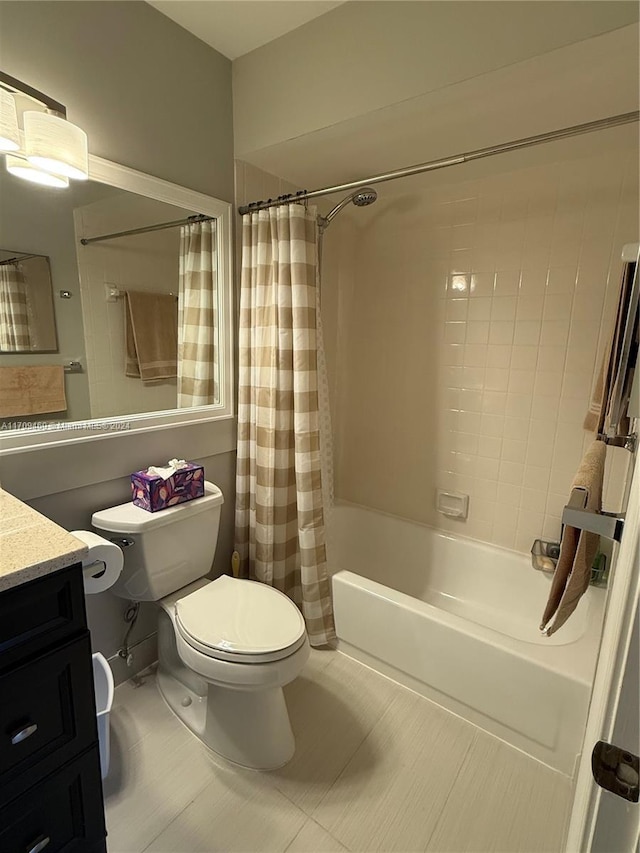 full bathroom with tile patterned flooring, vanity, toilet, and shower / bath combo with shower curtain