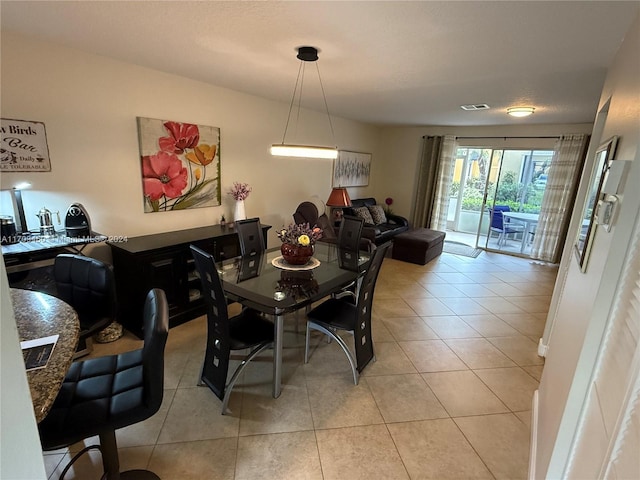 view of tiled dining space