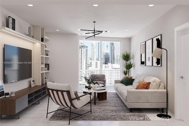 living room featuring a notable chandelier and recessed lighting