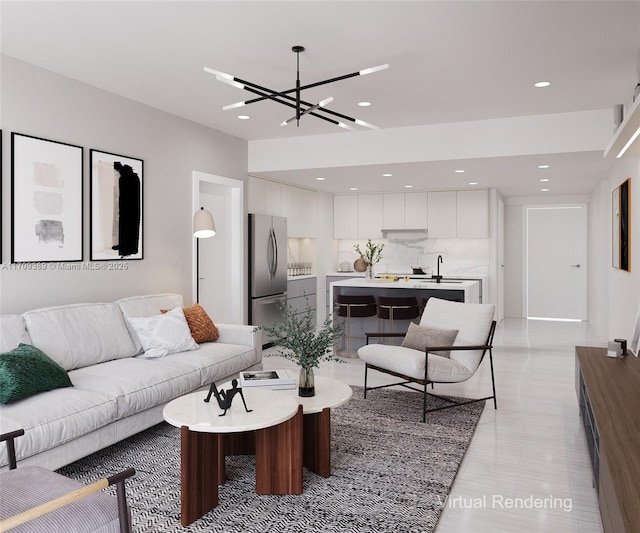 living room featuring a chandelier and sink