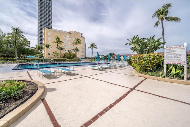 view of swimming pool featuring a patio