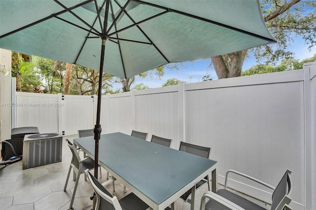 view of patio with cooling unit