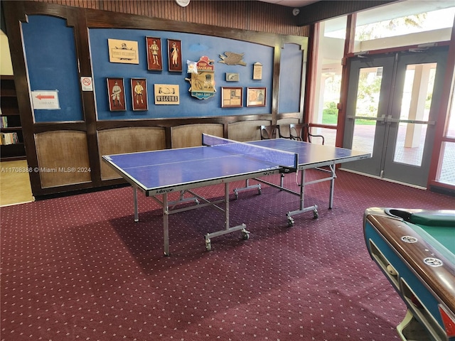 recreation room with carpet flooring and french doors