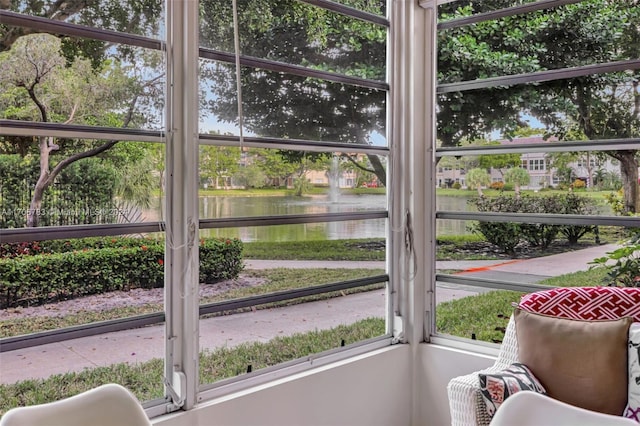 sunroom with a water view