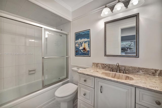 full bathroom featuring toilet, vanity, enclosed tub / shower combo, and ornamental molding