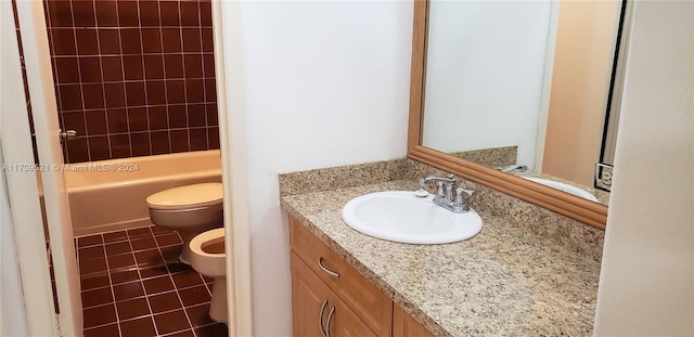 full bathroom featuring bathtub / shower combination, vanity, a bidet, tile patterned flooring, and toilet