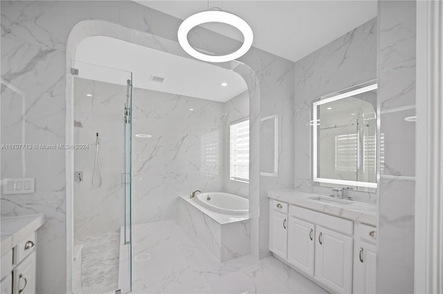 bathroom featuring vanity, tile walls, and plus walk in shower