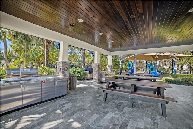 view of patio / terrace featuring a playground