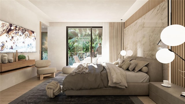 bedroom with wood-type flooring and multiple windows