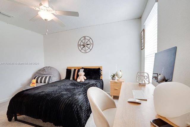 bedroom featuring carpet and ceiling fan