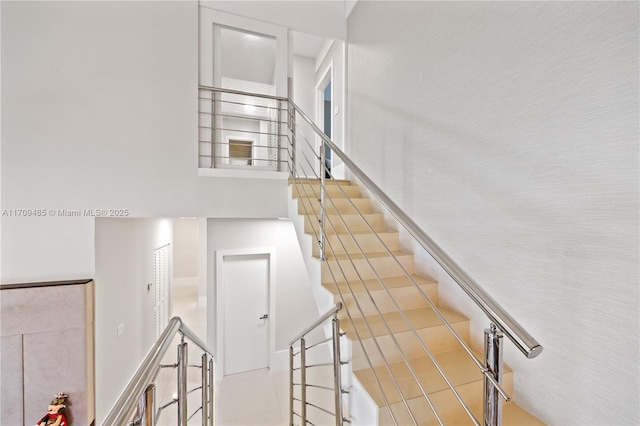 stairway with a high ceiling