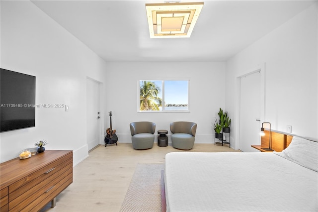 bedroom with light wood-type flooring