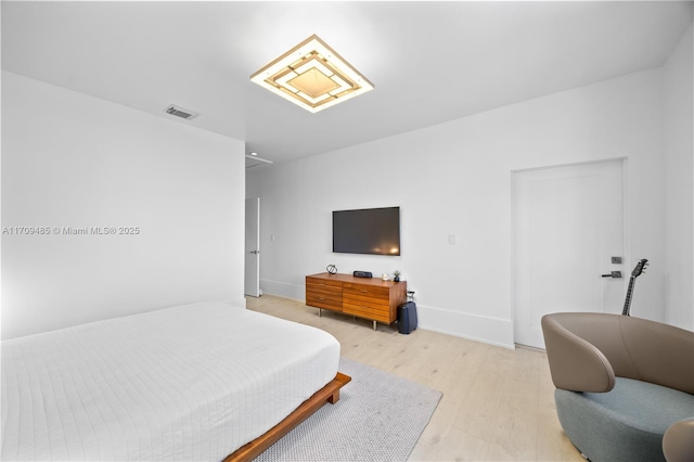 bedroom featuring light hardwood / wood-style flooring