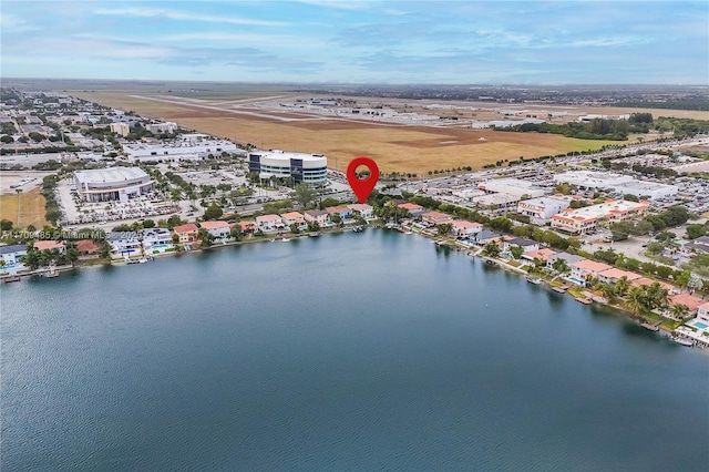 bird's eye view with a water view