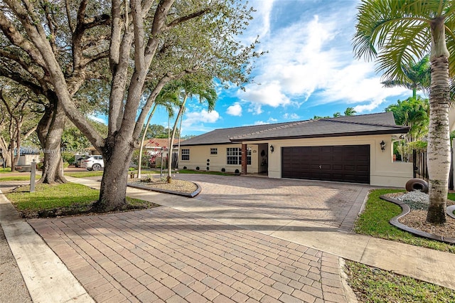 single story home with a garage