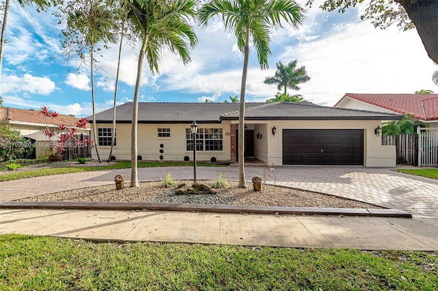 ranch-style home with a garage