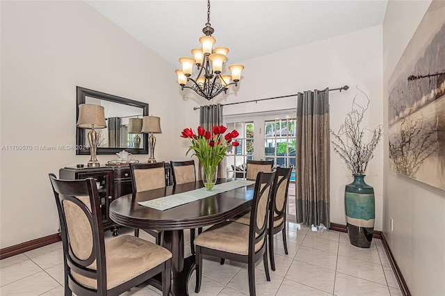 dining area featuring light tile patterned floors and a chandelier