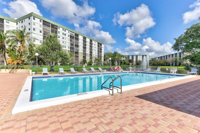 view of swimming pool featuring a patio area