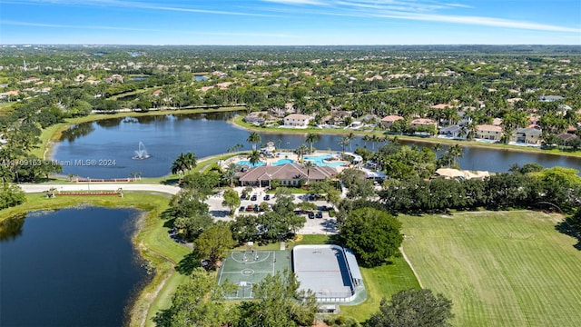 birds eye view of property featuring a water view