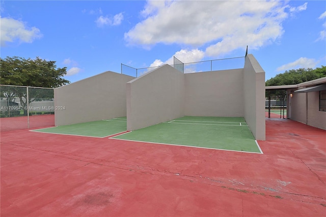 view of tennis court with basketball court