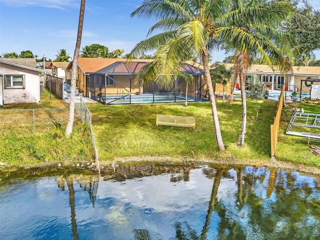 8910 NW 7th Ct, Pembroke Pines, FL 33024 - water view featuring a fenced backyard