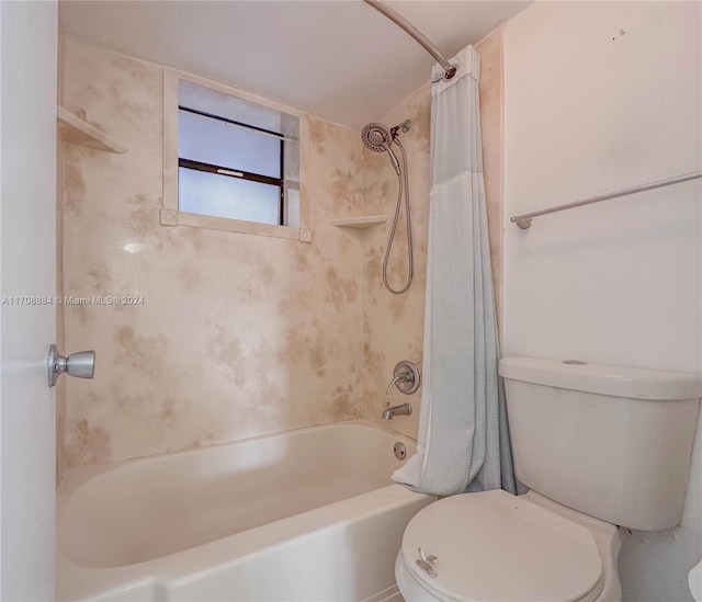 bathroom with toilet and shower / bathtub combination with curtain