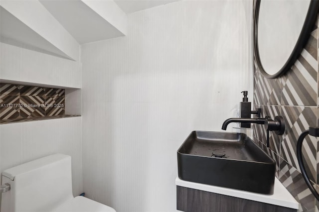 bathroom with sink and toilet