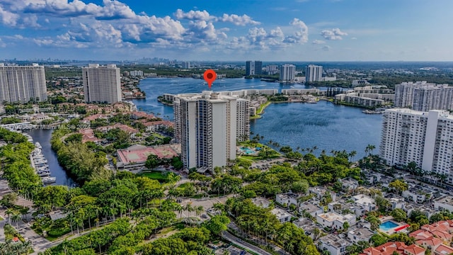 birds eye view of property with a water view